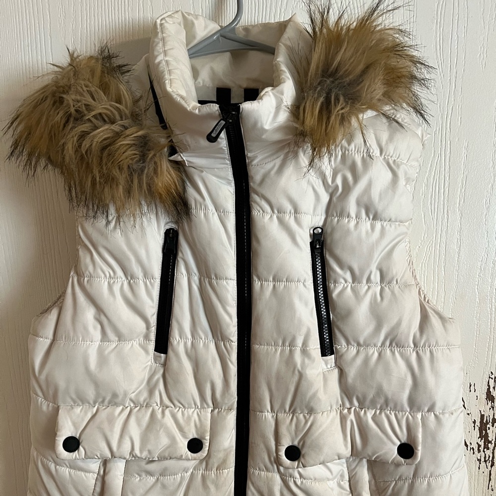 Calvin Kline performance.   Fur vest.   size large no rips or tares